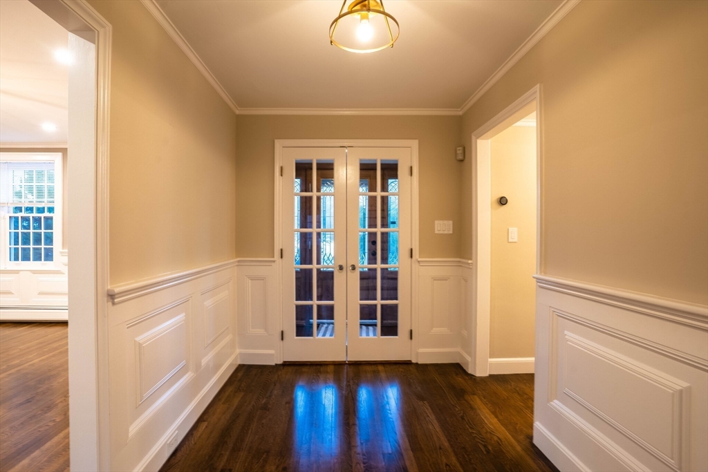 40 Puddingstone Lane Newton, MA 02459 - Photo 29 of 32 wooden floor in an empty room with a window
