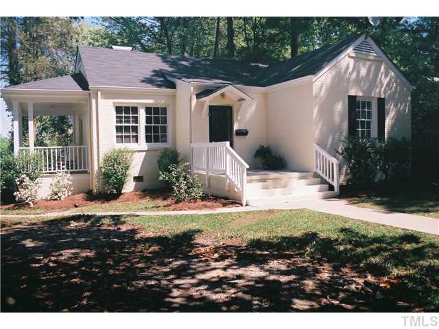3306 Hall Street Raleigh, NC 27607 - Photo 1 of 6 a view of a white house with a yard