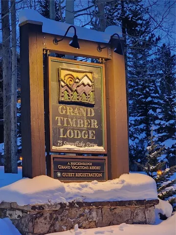 a bed sitting in a bedroom next to a door