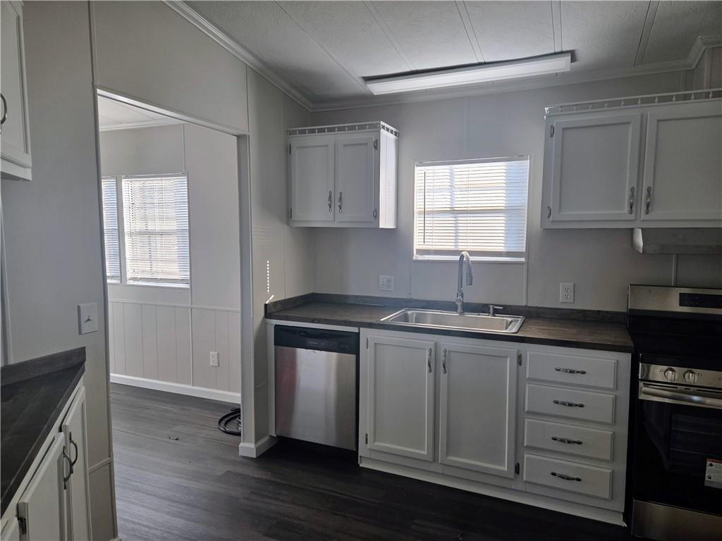 190 B Sweetwater Branch Road Fort Mitchell, AL 36856 - Photo 6 of 18 Kitchen featuring dark countertops, stainless steel appliances