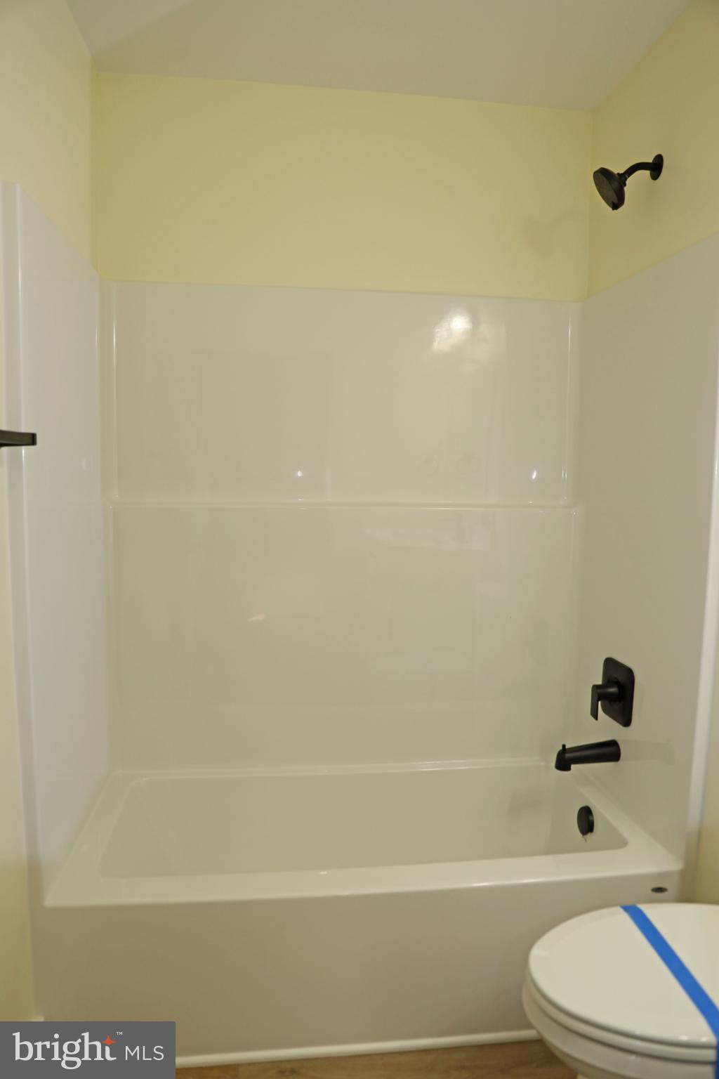 69 Bait Road Inwood, WV 25428 - Photo 23 of 52 a bathroom with a toilet and a shower