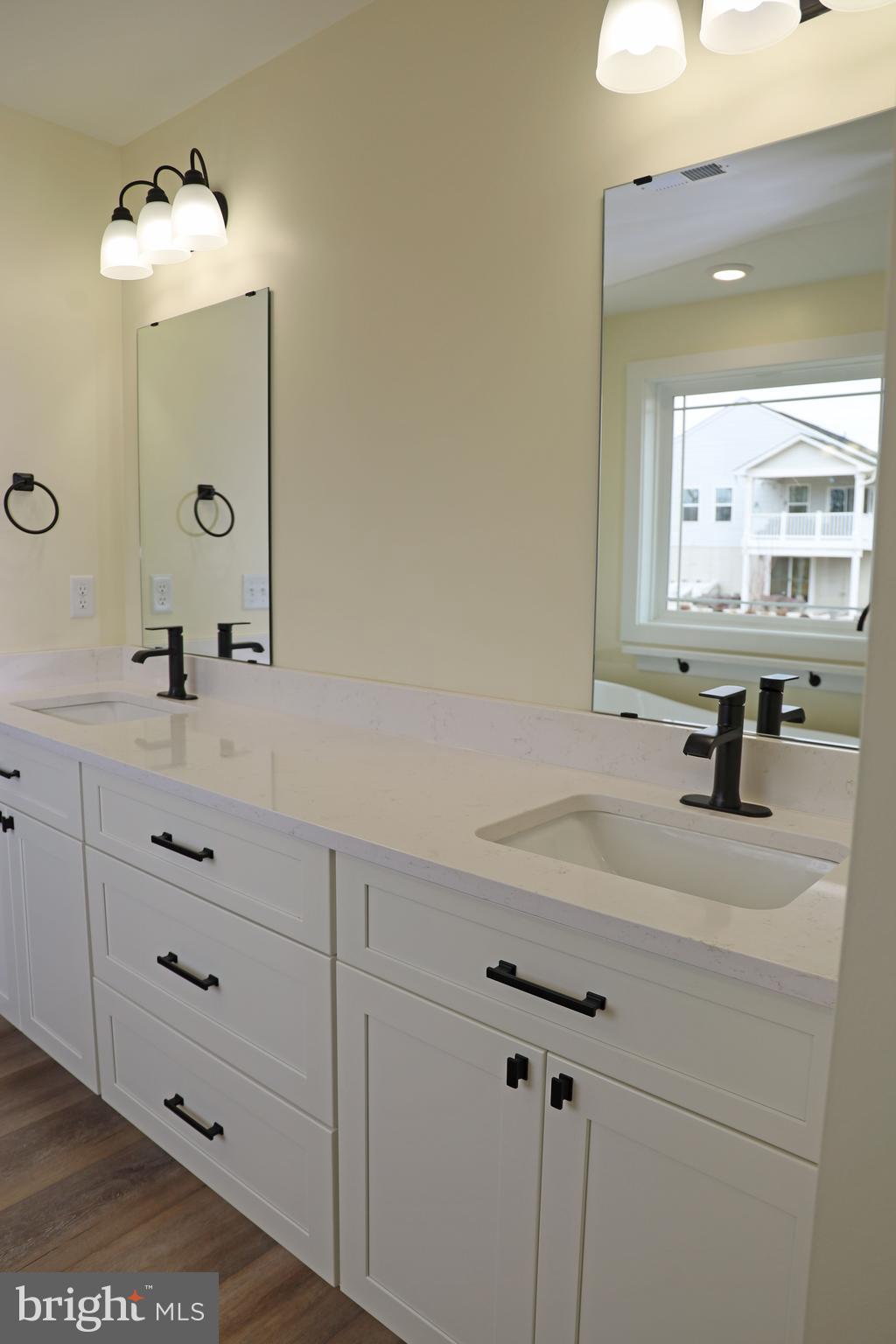 69 Bait Road Inwood, WV 25428 - Photo 34 of 52 a bathroom with a sink vanity and mirror