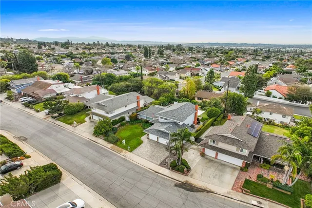an aerial view of a city with lots of residential buildings
