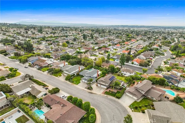 an aerial view of a city with lots of residential buildings