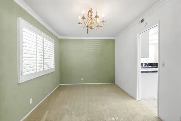 a view of a chandelier in a room