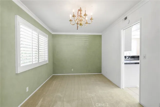 a view of a chandelier in a room