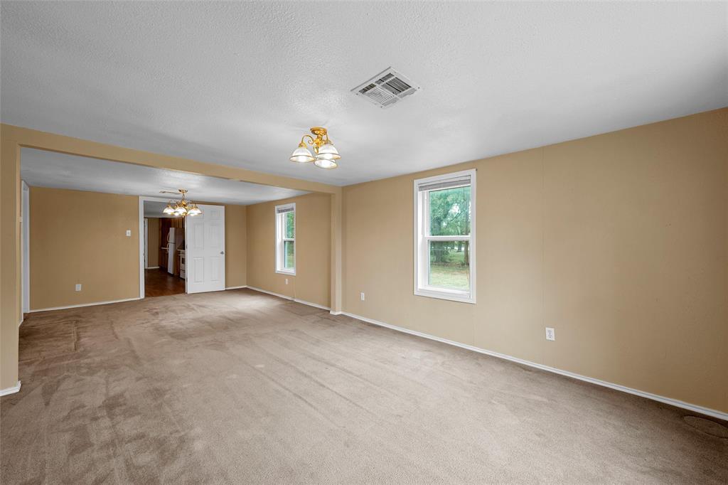 4704 Williams Road Bellmead, TX 76705 - Photo 10 of 32 Formal Dining and Living Room combination
