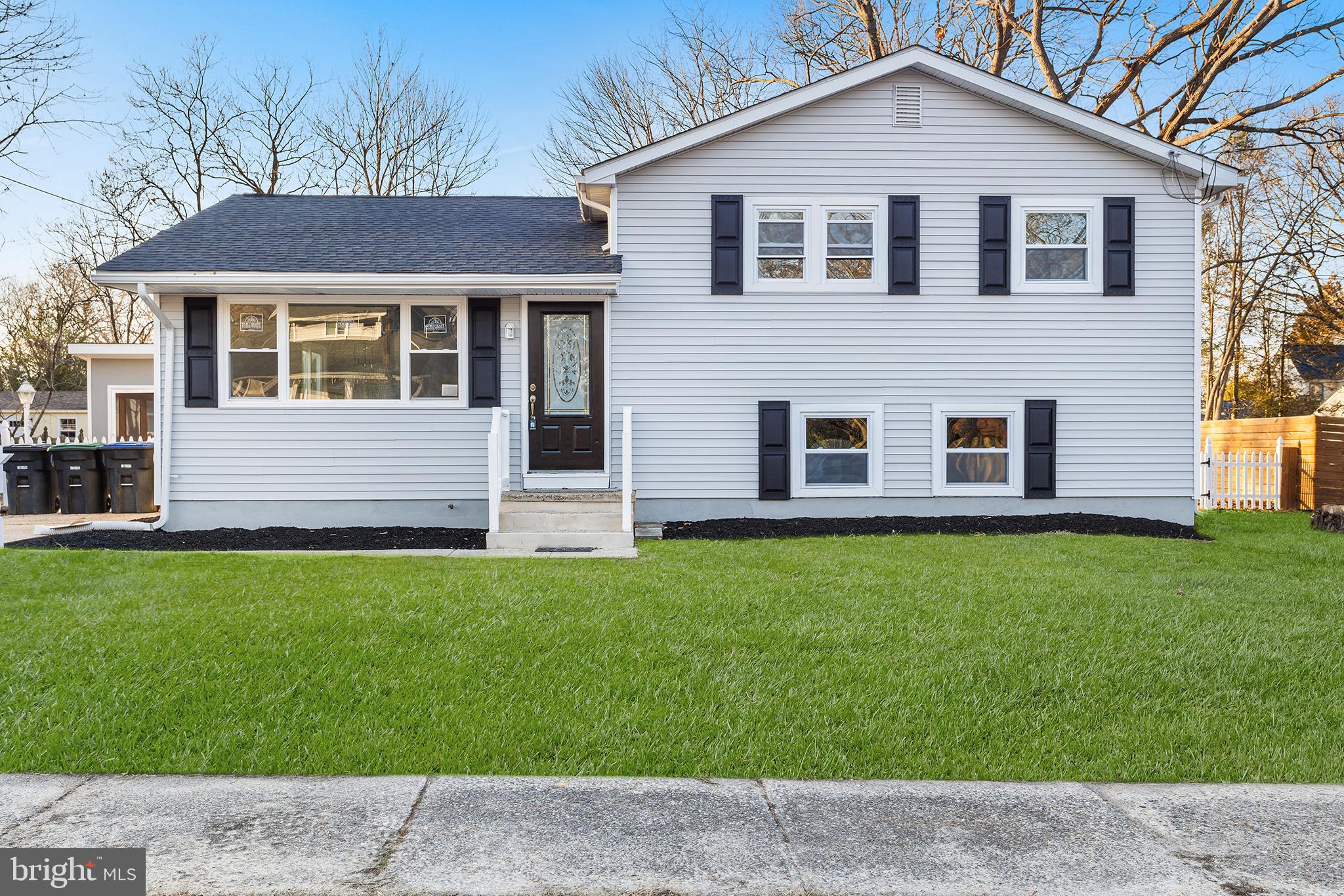 520 Myrtle Avenue Lindenwold, NJ 08021 - Photo 1 of 31 a view of a yard in front of a house with plants