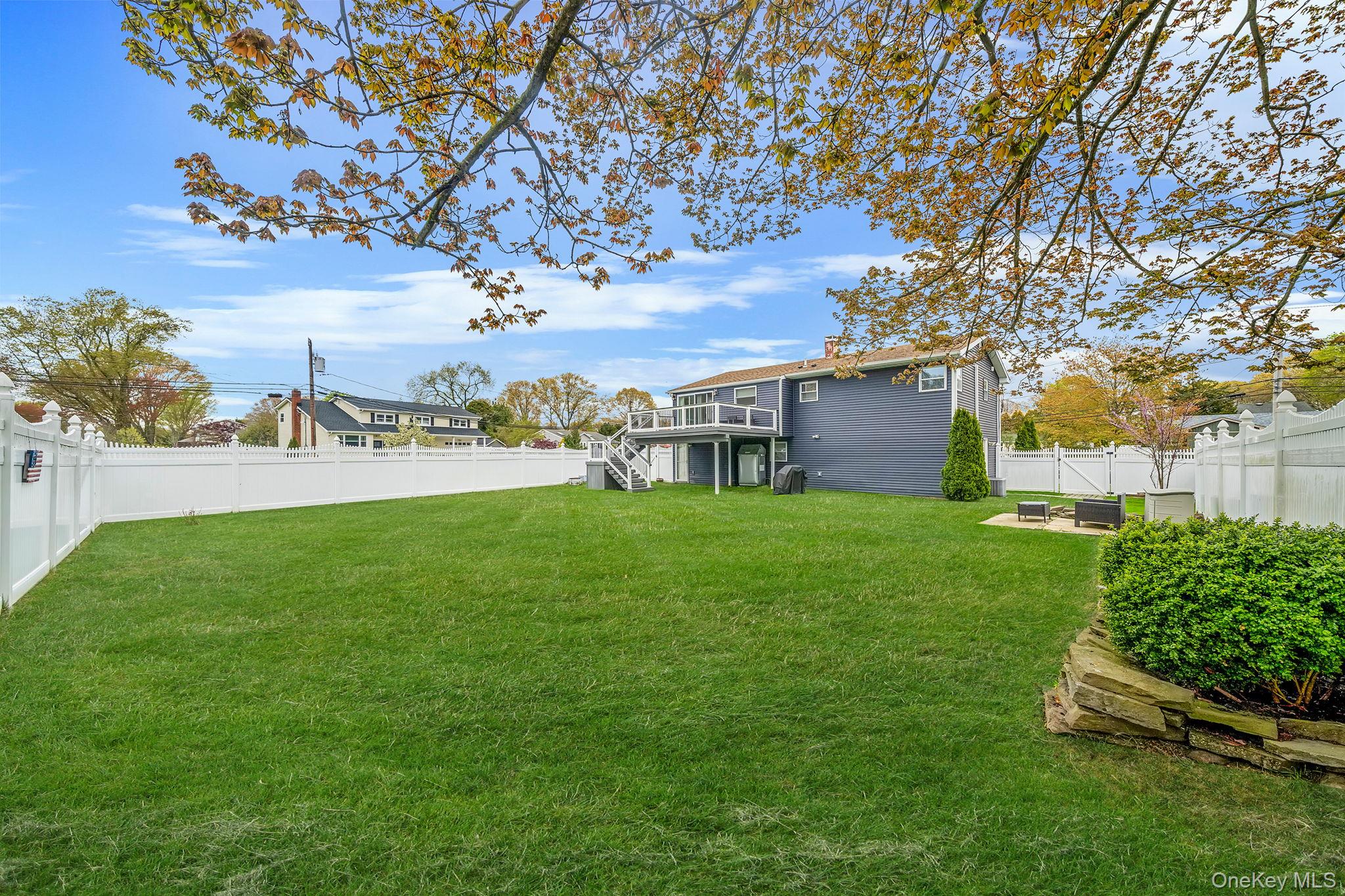 110 Stephen Road Bayport, NY 11705 - Photo 6 of 39 a view of yard with swimming pool and green space