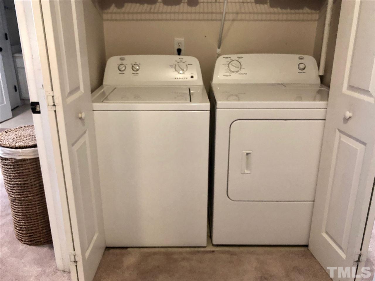 8126 Rhiannon Road Raleigh, NC 27613 - Photo 19 of 24 a utility room with dryer and washer