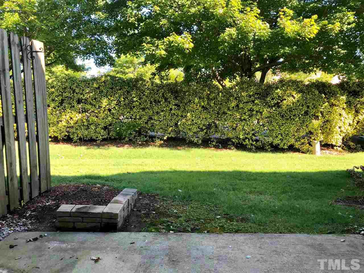 8126 Rhiannon Road Raleigh, NC 27613 - Photo 24 of 24 a view of outdoor space and swimming pool