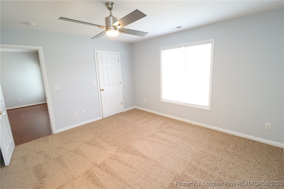 4105 Scofield Drive Raleigh, NC 27610 - Photo 14 of 27 a view of an empty room with a window