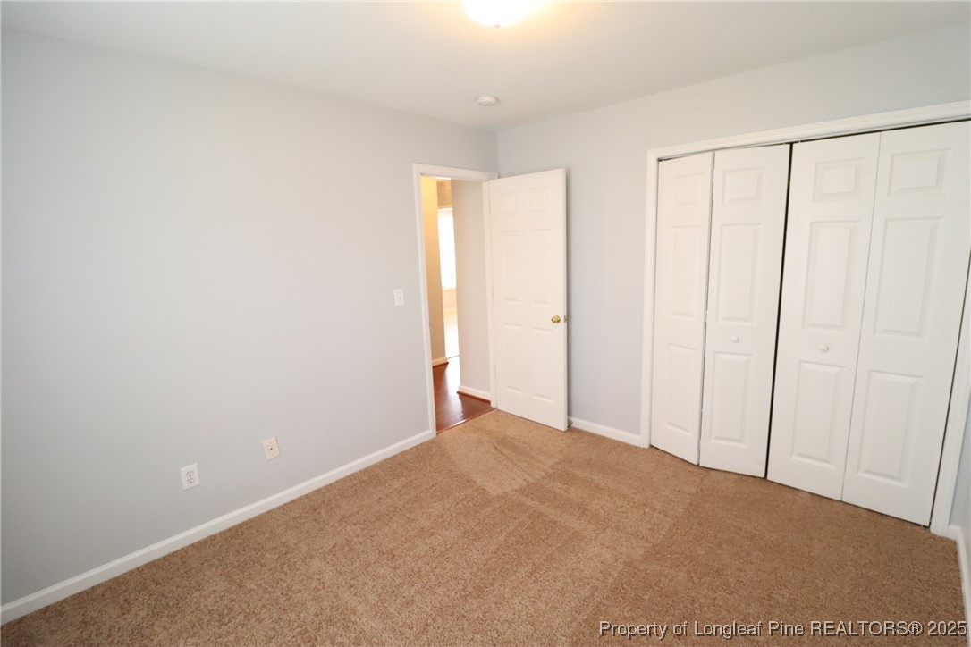 4105 Scofield Drive Raleigh, NC 27610 - Photo 26 of 27 a view of an empty room