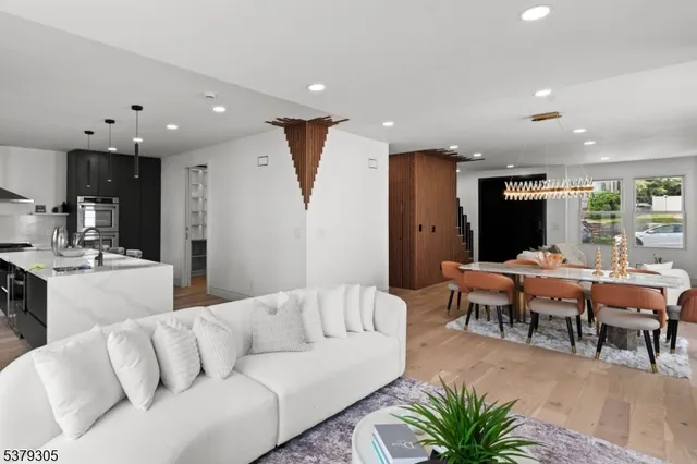 a living room with furniture and a table