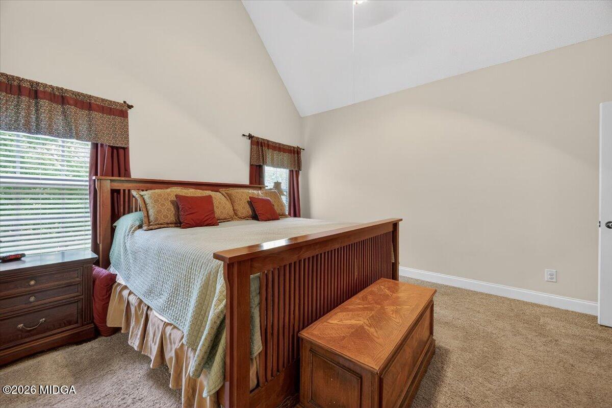 619 Grayridge Road Gray, GA 31032 - Photo 17 of 40 a bedroom with a bed and a dresser