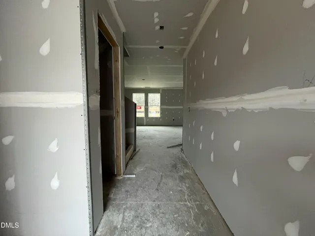 a view of empty room with windows