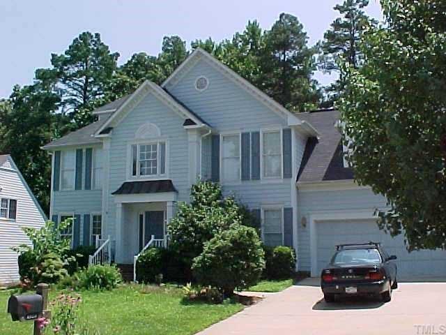 a house view with a garden space