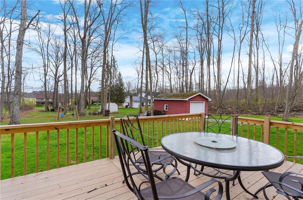 115 Milton Street Clark, PA 16113 - Photo 19 of 24 a balcony with table and chairs