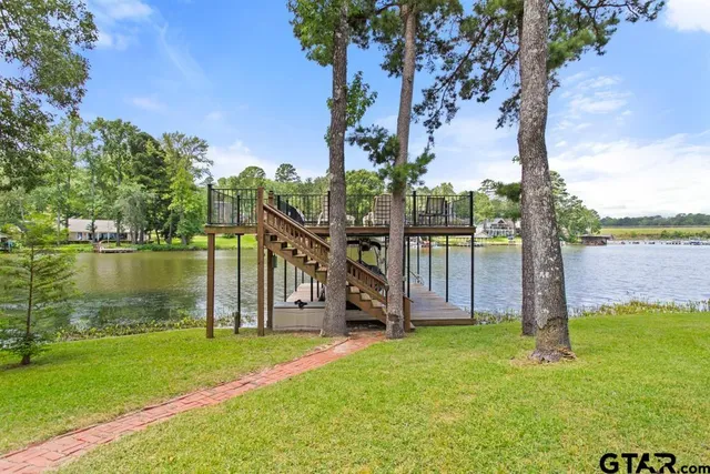 a view of a garden with a lake