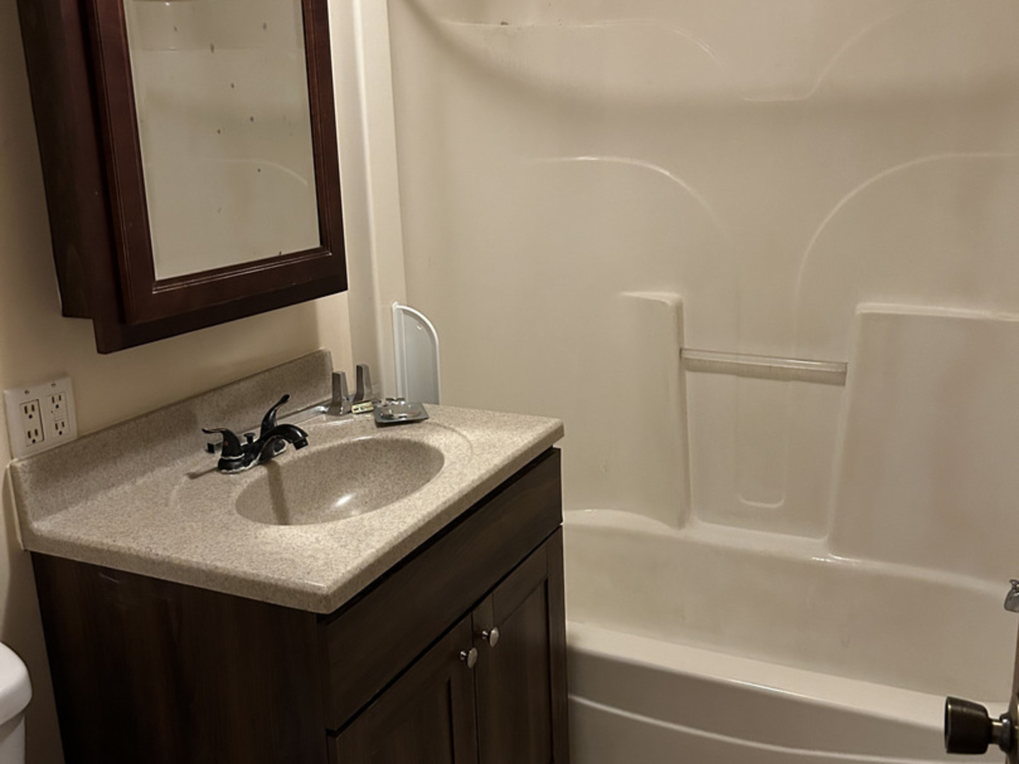 817 2nd Avenue Morris, IL 60450 - Photo 12 of 16 a bathroom with a sink and a mirror