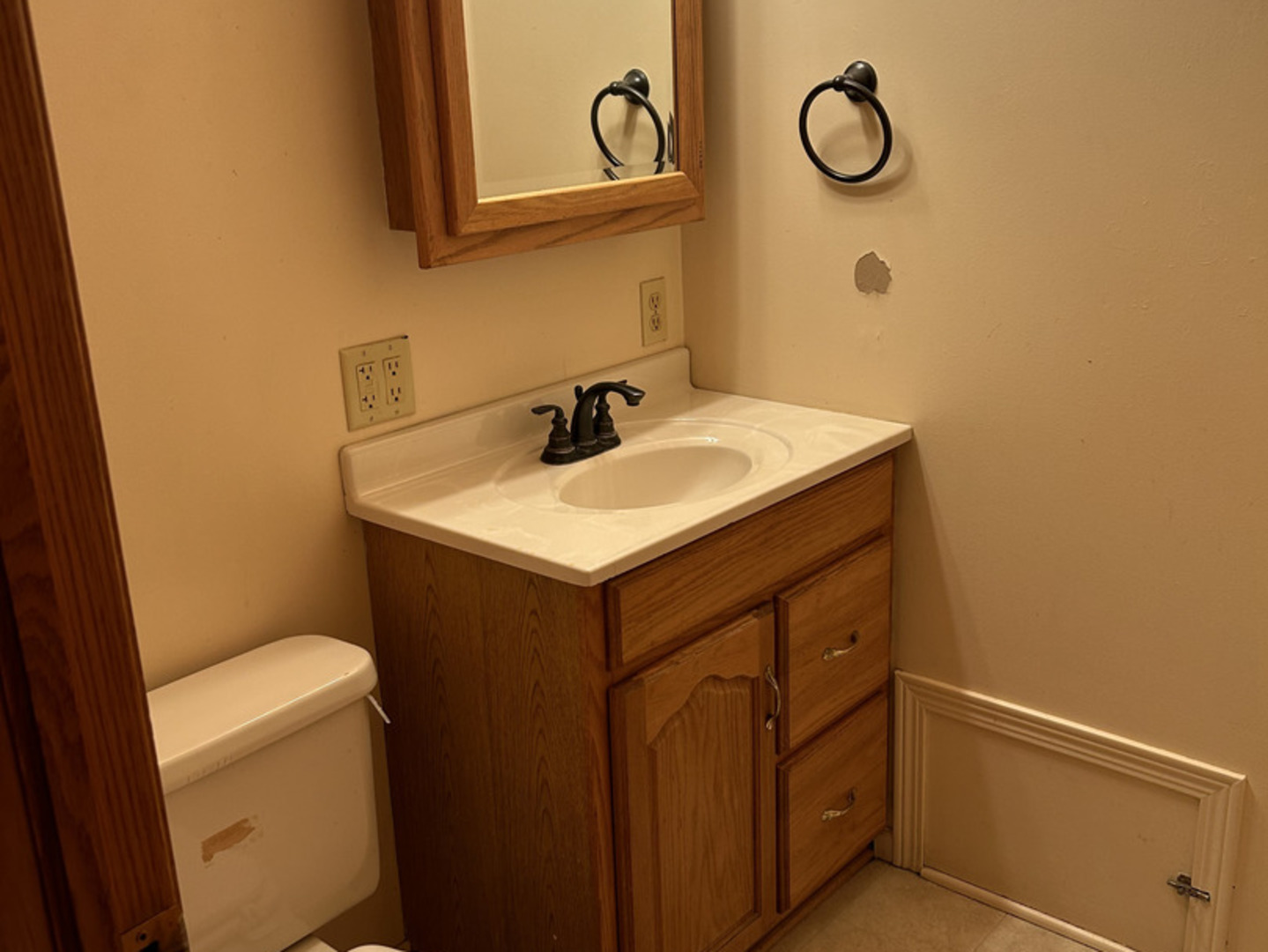 817 2nd Avenue Morris, IL 60450 - Photo 10 of 16 a bathroom with a sink and a toilet