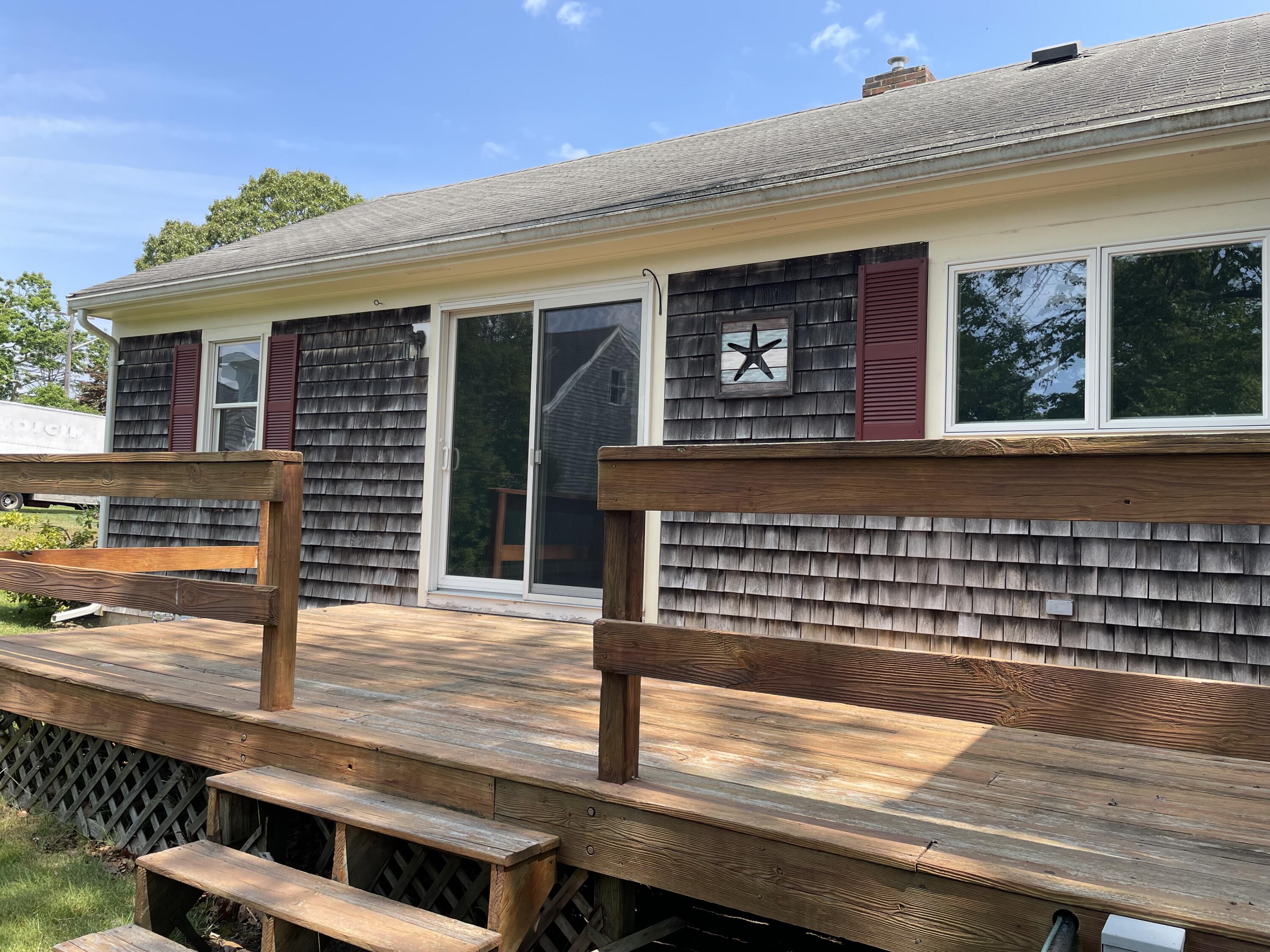 21 Long Road Harwich, MA 02645 - Photo 5 of 18 a view of house with wooden deck