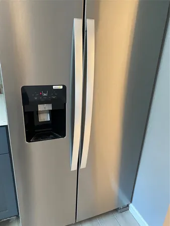 a close view of a refrigerator in kitchen