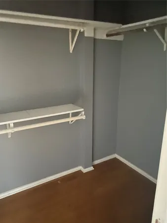 a view of a room with racks on the wall