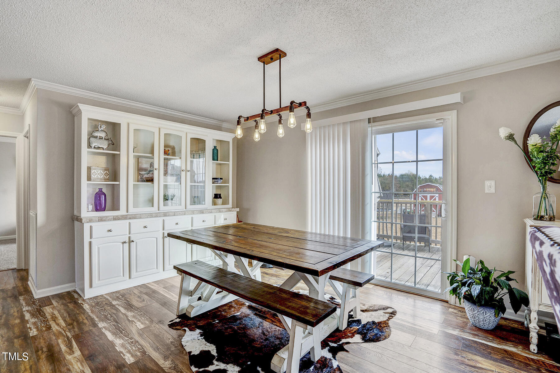 1645 Denning Road Benson, NC 27504 - Photo 12 of 17 a workspace with furniture and a chandelier