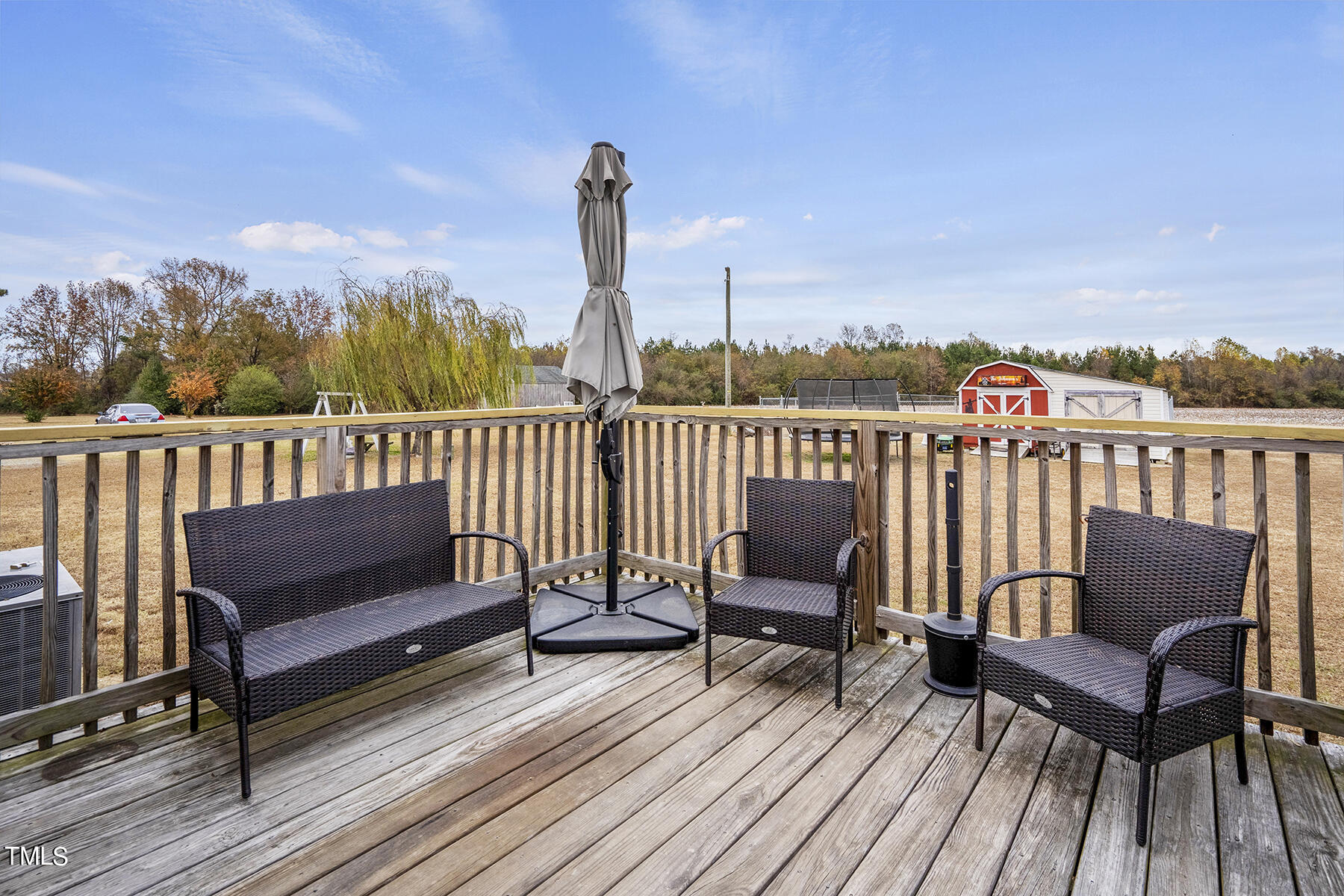 1645 Denning Road Benson, NC 27504 - Photo 17 of 17 a view of a chairs in wooden deck