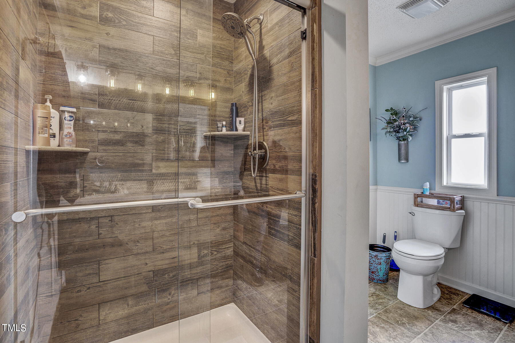 1645 Denning Road Benson, NC 27504 - Photo 6 of 17 a bathroom with a shower toilet and sink