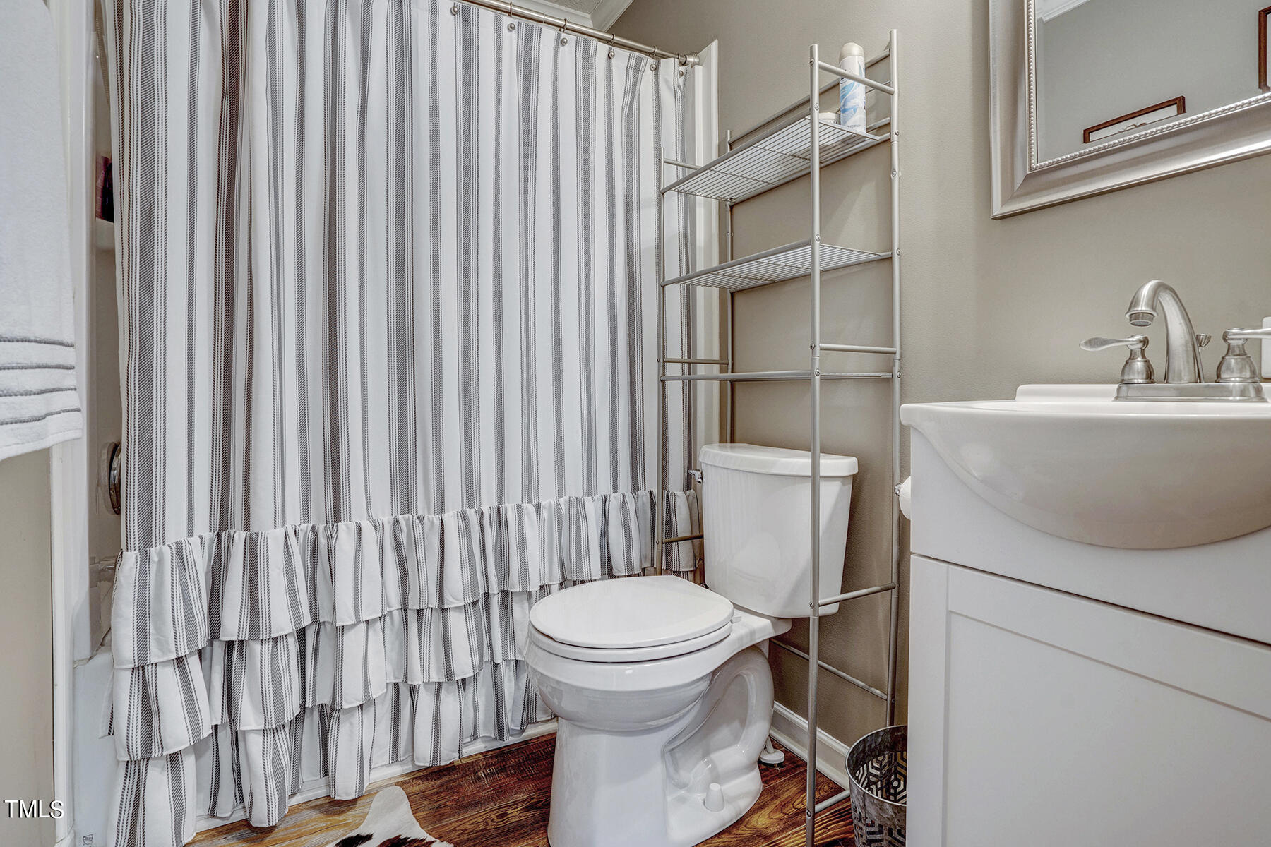 1645 Denning Road Benson, NC 27504 - Photo 8 of 17 a bathroom with a toilet and a sink