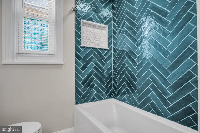 a bathroom with a bathtub