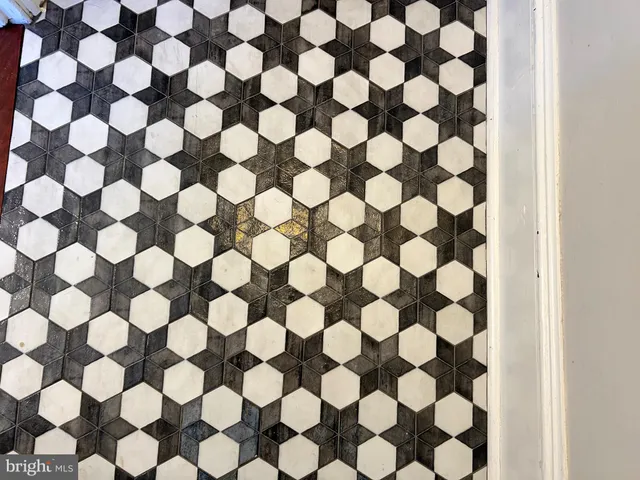a view of a black and white checkered floor