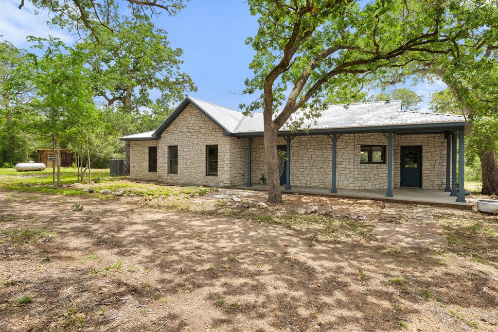 244 Woodway Elgin, TX 78621 - Photo 4 of 40 a house with trees in the background