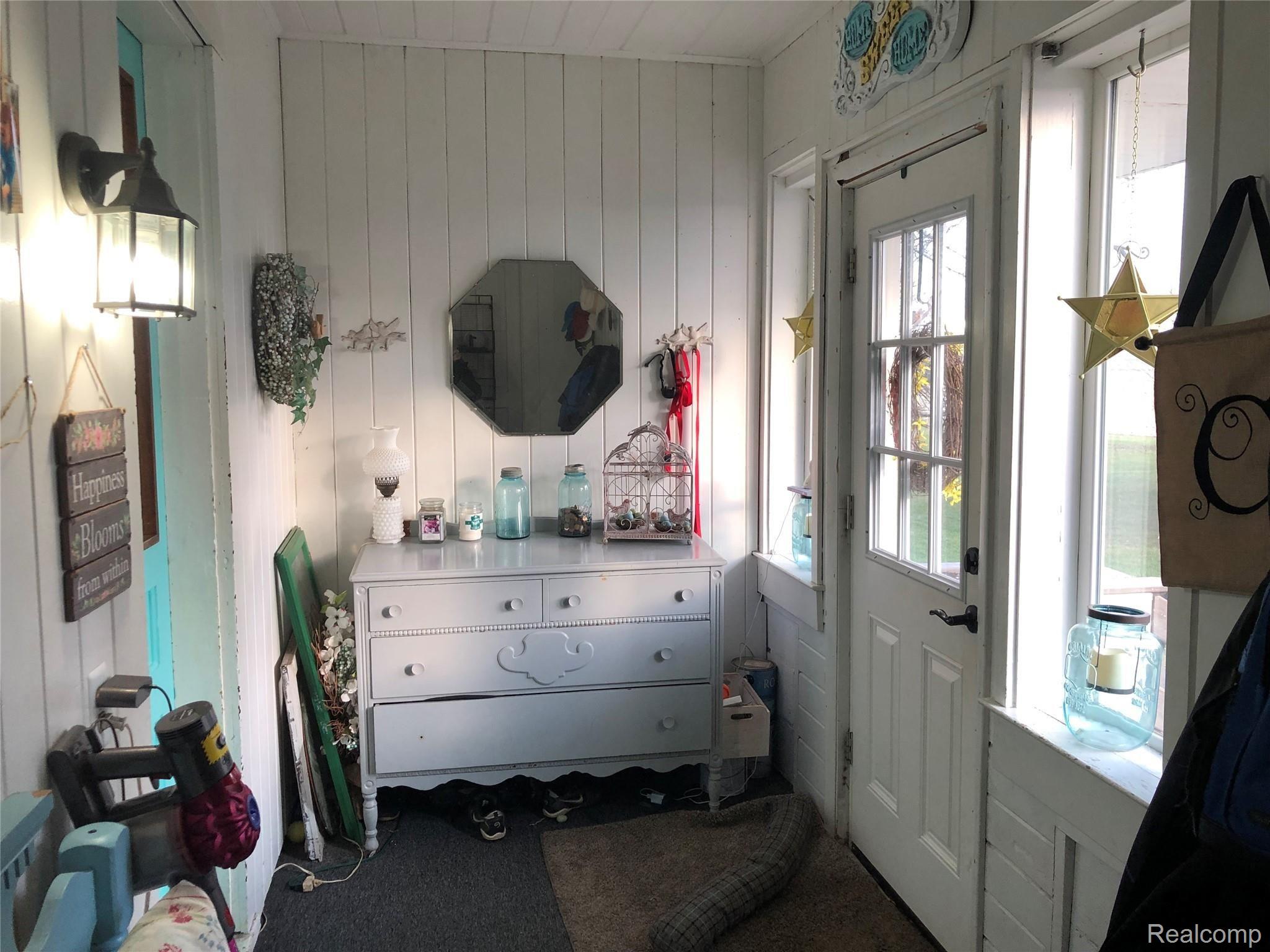 6438 East Bennington Road Durand, MI 48429 - Photo 19 of 27 Back Door Entrance Room With Lost Of Storage & Charm!