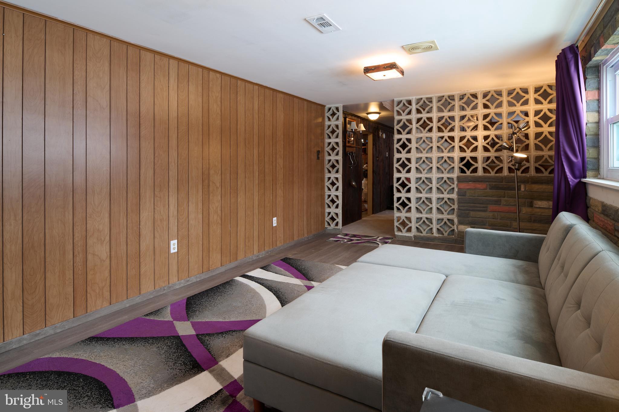 574 Buffalo Run Road Bellefonte, PA 16823 - Photo 15 of 54 a living room with furniture and shower