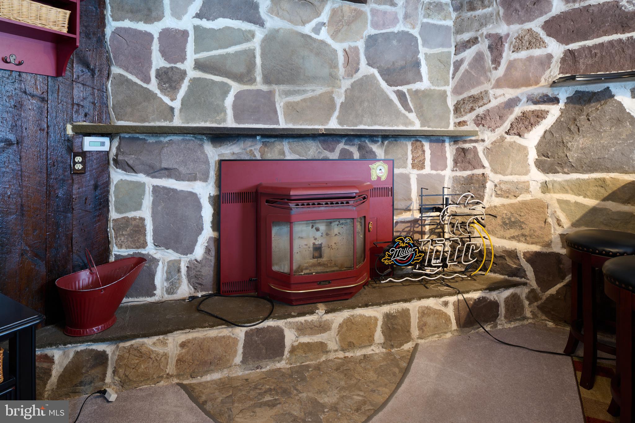 574 Buffalo Run Road Bellefonte, PA 16823 - Photo 21 of 54 a room with fireplace