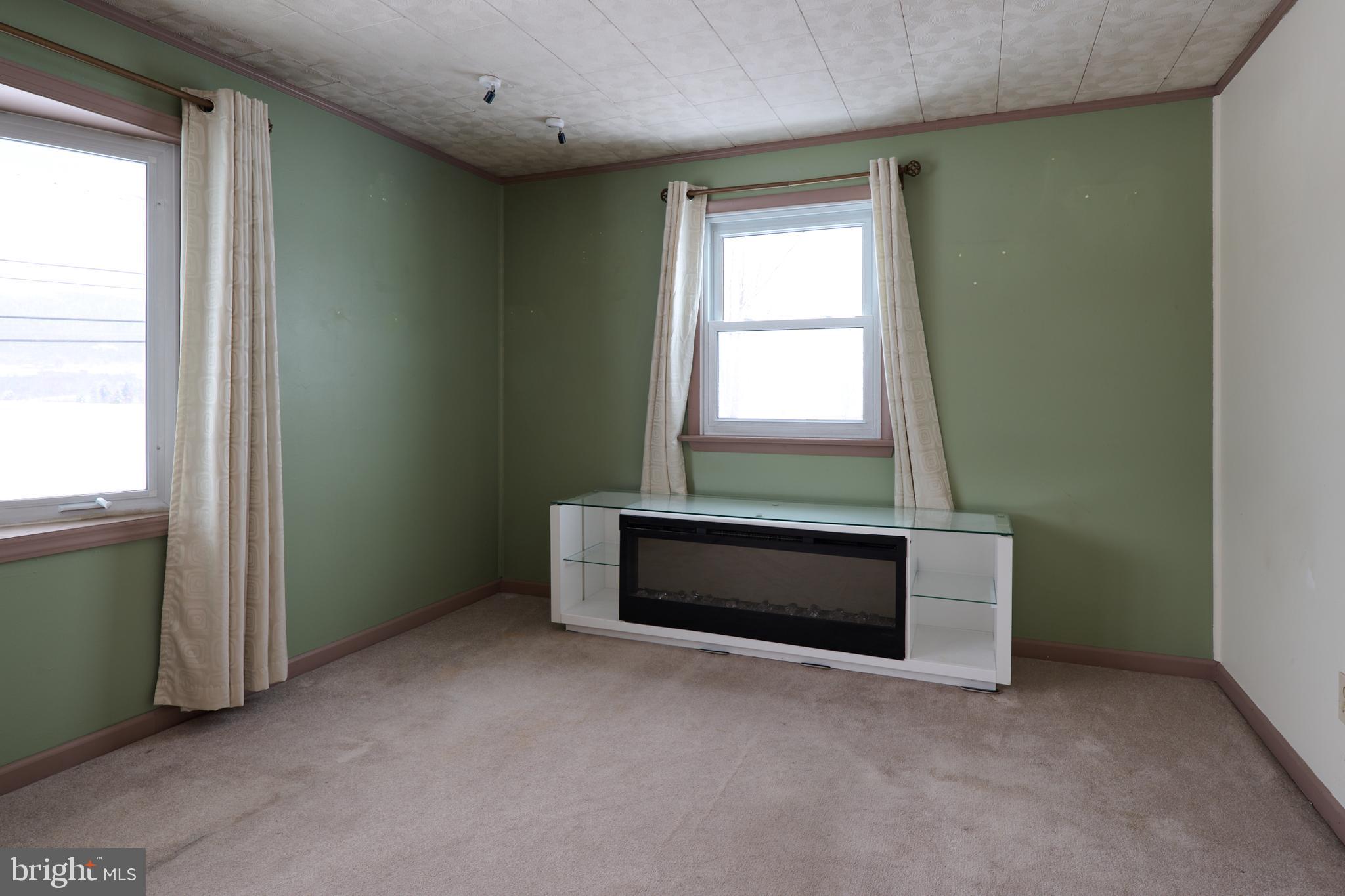 574 Buffalo Run Road Bellefonte, PA 16823 - Photo 30 of 54 a room with window and furniture