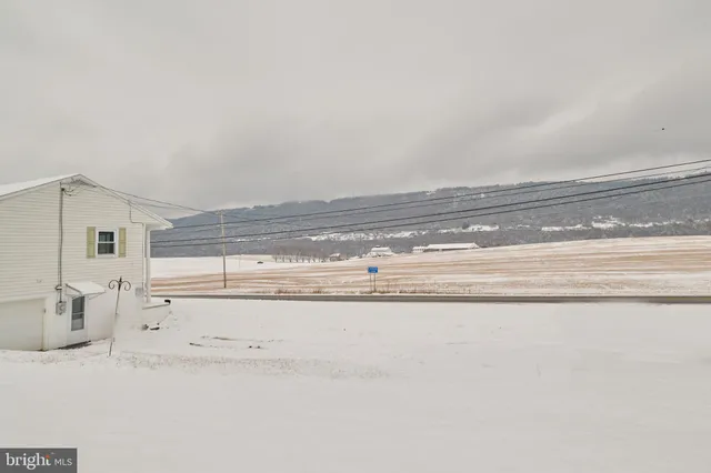 a view of a livingroom with a stove