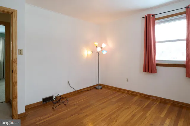 a room with window and closet