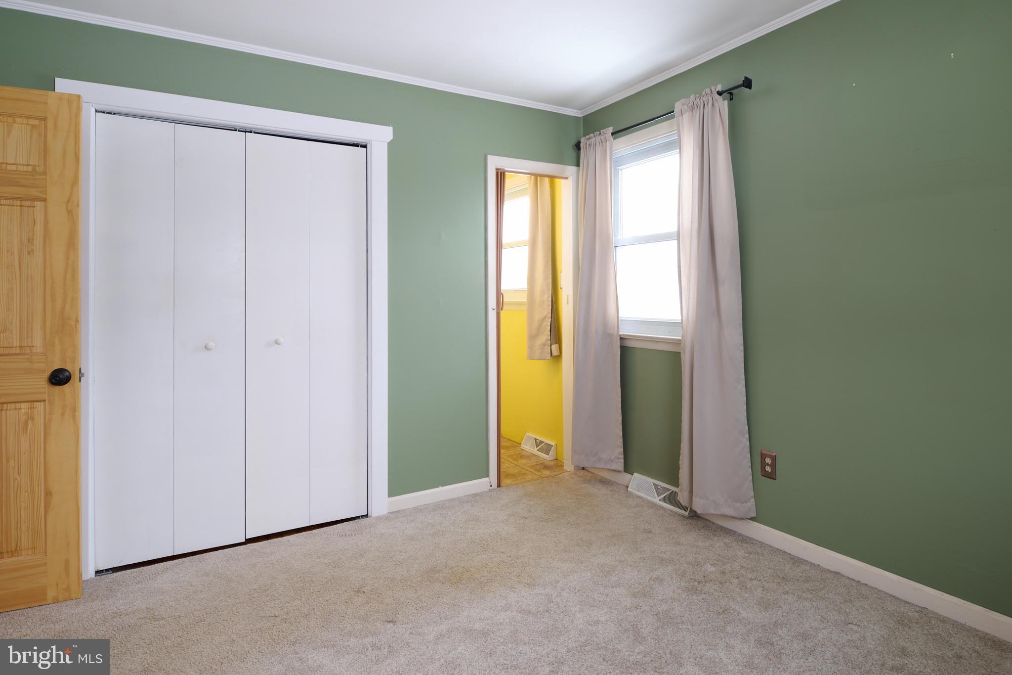 574 Buffalo Run Road Bellefonte, PA 16823 - Photo 40 of 54 a view of an empty room with closet and a window