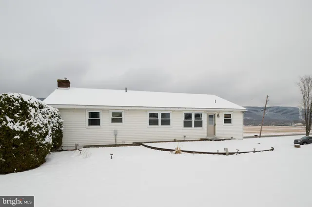 a kitchen with a refrigerator a stove a sink dishwasher and a refrigerator