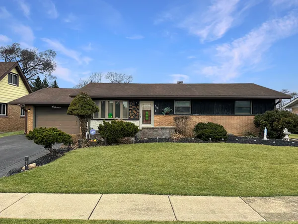 a view of a house with garden