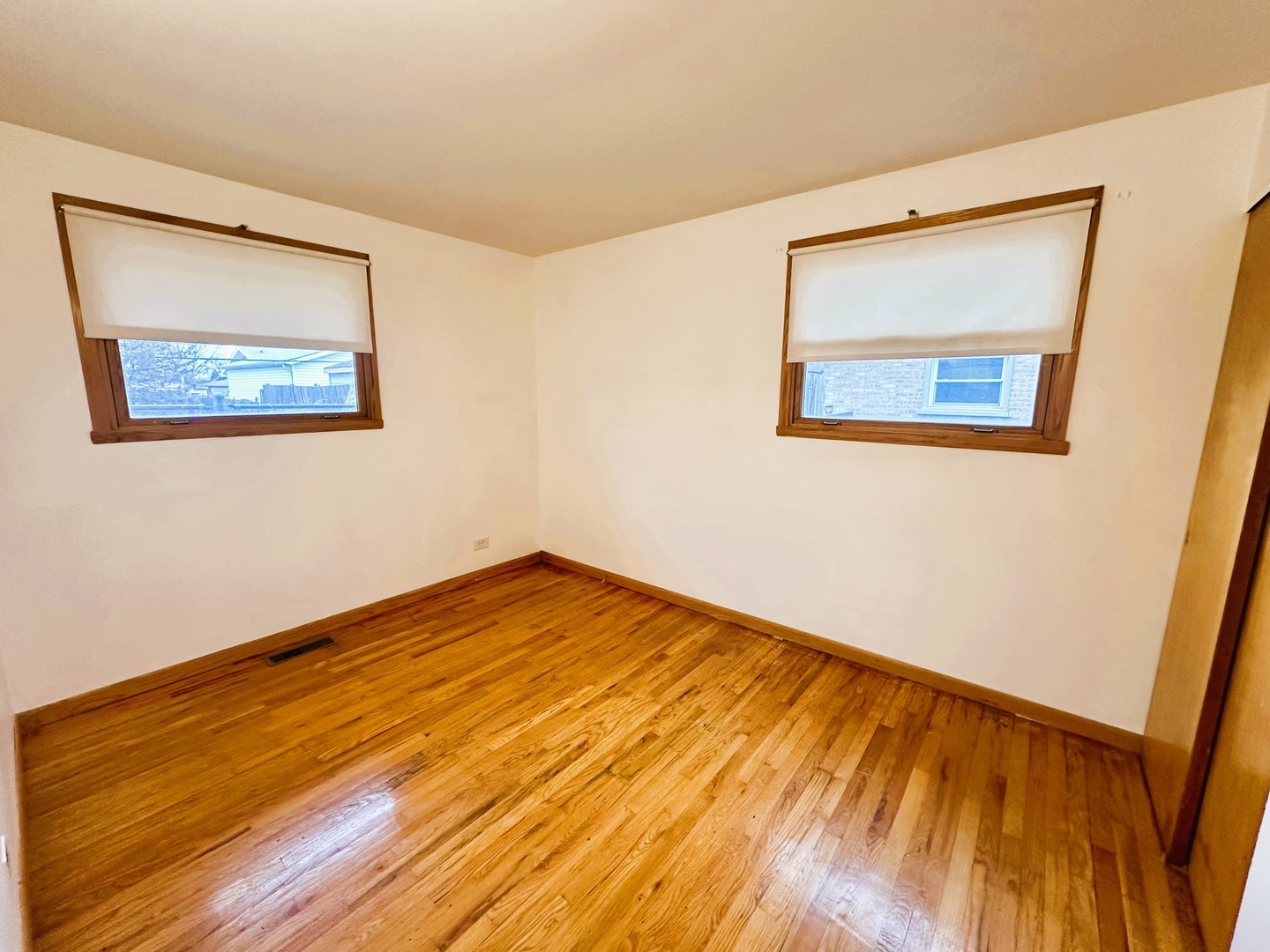 9112 Homestead Lane Bridgeview, IL 60455 - Photo 20 of 29 a view of an empty room with wooden floor