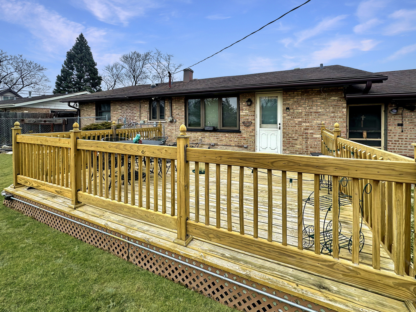 9112 Homestead Lane Bridgeview, IL 60455 - Photo 25 of 29 a view of a house with a wooden deck