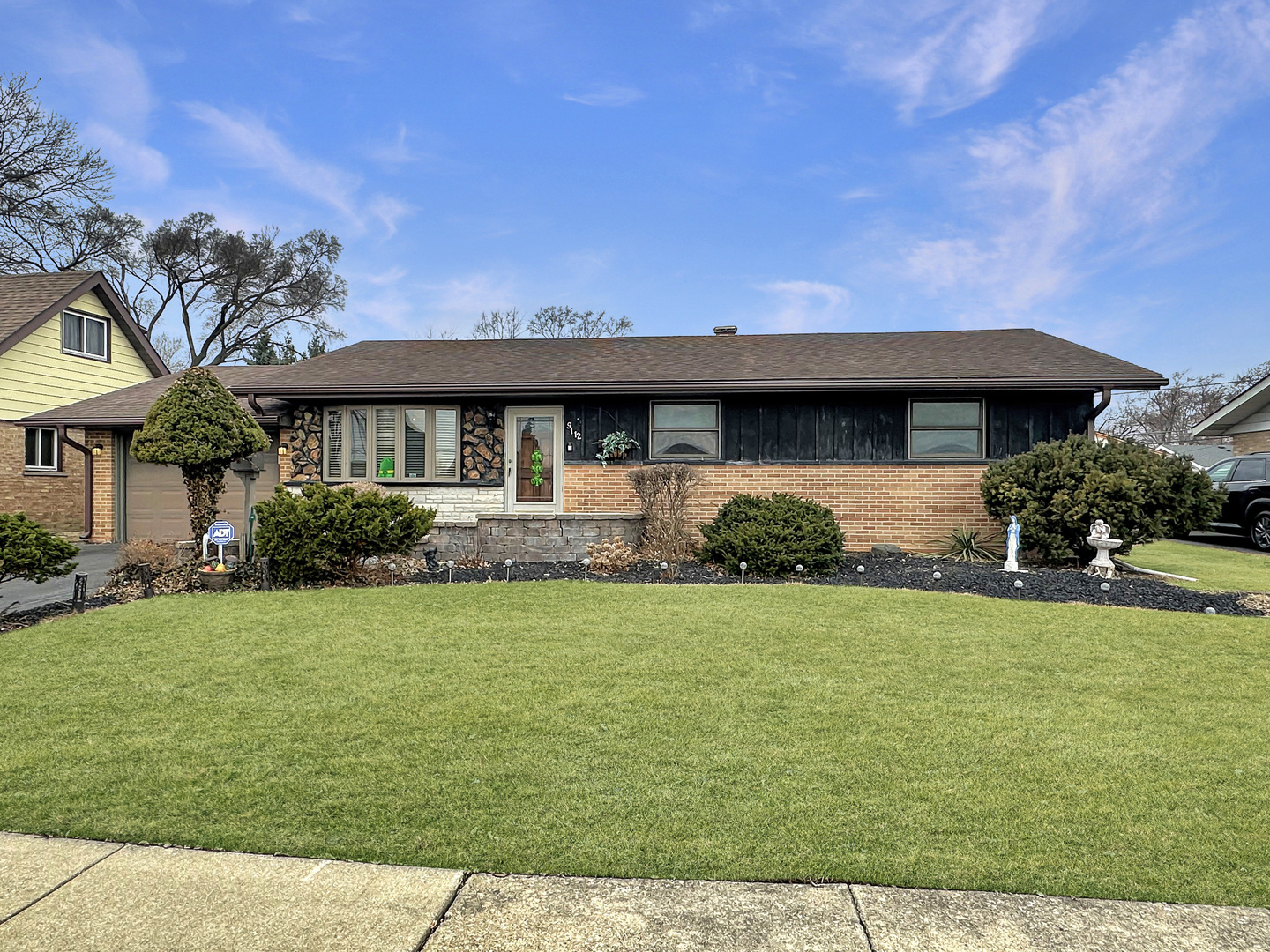 9112 Homestead Lane Bridgeview, IL 60455 - Photo 29 of 29 a front view of a house with garden