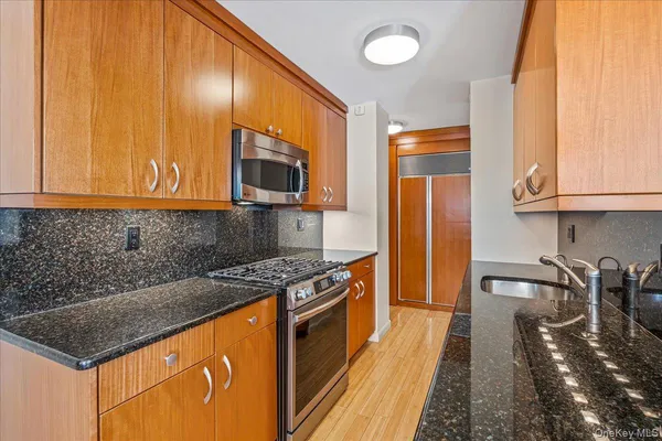 $430,000 | 17-85 215th Street, Unit 8G | Bay Terrace