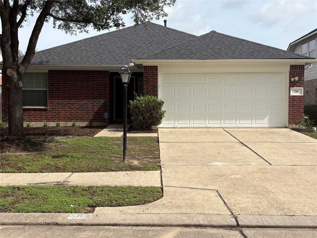 a front view of house with garage