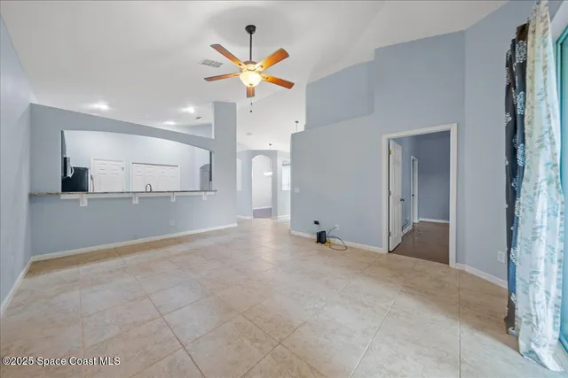 a view of a kitchen with a sink and cabinet area